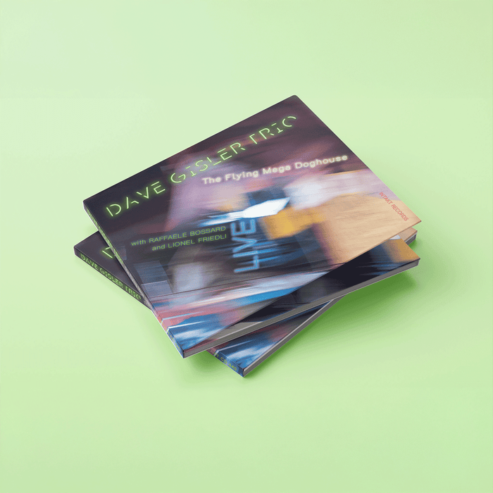 Two music albums by Dave Gilder Trio on a light green background