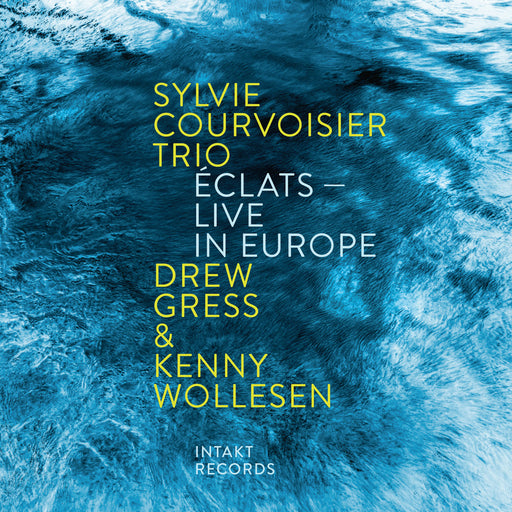 Album cover for Sylvie Courvoisier Trio featuring blue abstract design and text.